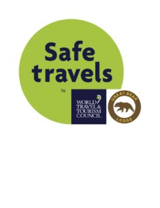 Safe Travels logo certifying Great Bear Lodge as a safe destination during COVID